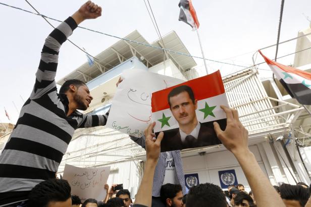 Pro-Assad Demonstranten 2017 in Damaskus. Pro-Assad Demonstranten 2017 in Damaskus.