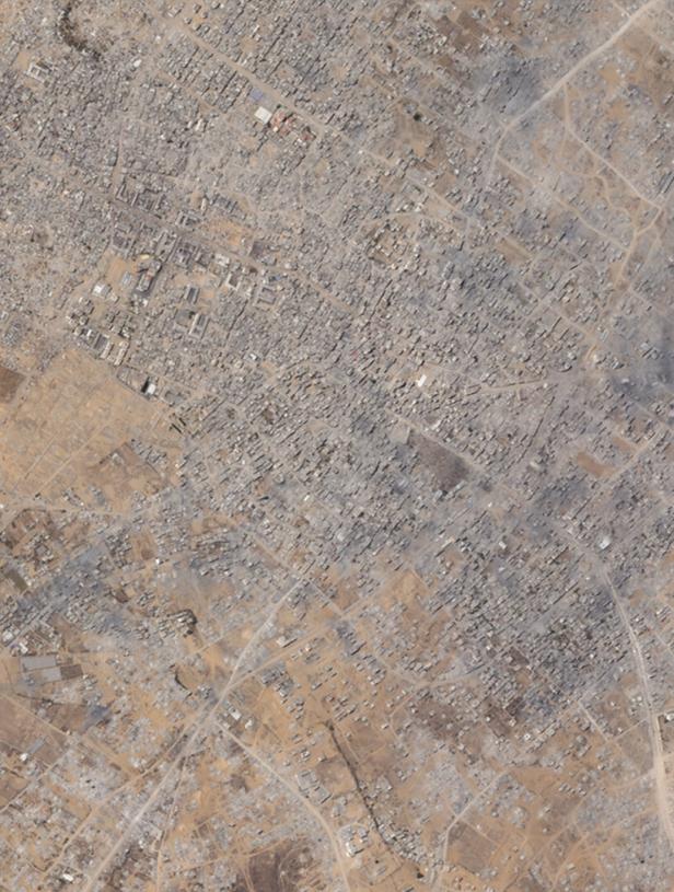 Satellitenbild einer zerstörten Stadt