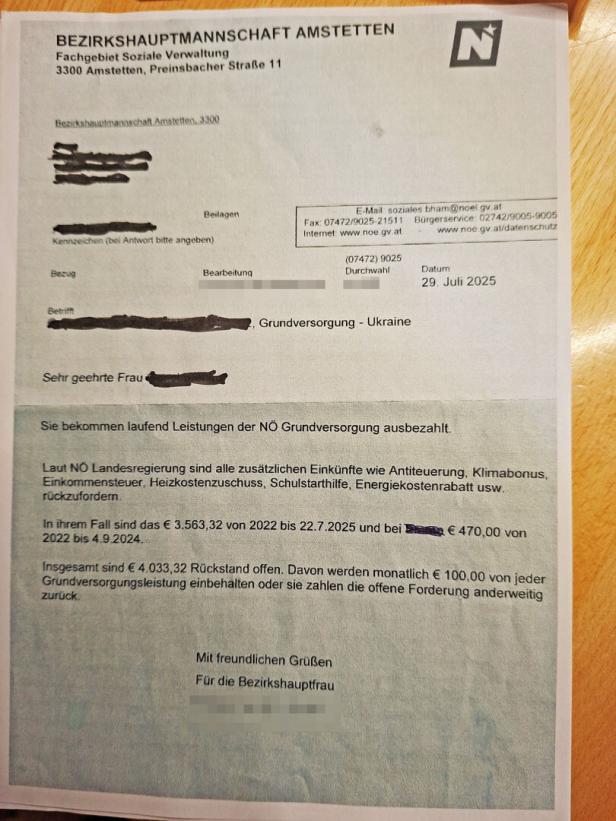 Man sieht einen Behördenbrief an Ukrainer, über den Abzug von Geldern