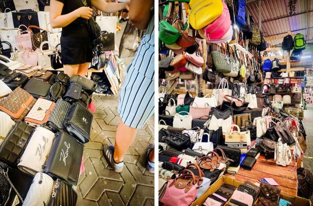 Jugendliche kaufen gefälschte Taschen an einem Marktstand in der Excalibur City