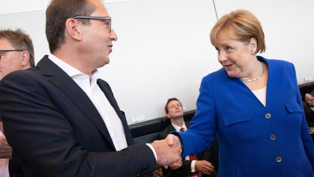 Angela Merkel und Alexander Dobrindt, Vorsitzender der CSU-Landesgruppe im Deutschen Bundestag Angela Merkel und Alexander Dobrindt, Vorsitzender der CSU-Landesgruppe im Deutschen Bundestag
