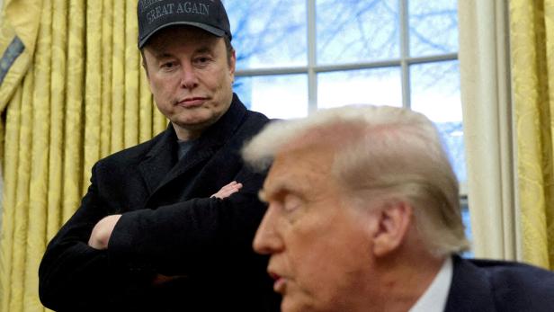 FILE PHOTO: FILE PHOTO: Elon Musk and President Donald Trump are shown in the Oval Office in Washington