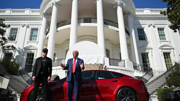 US President Trump unveils a Tesla car at the White House