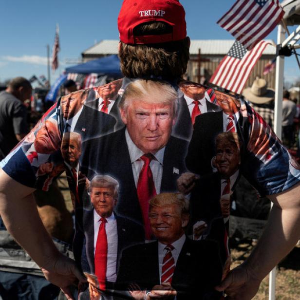 A participant of &#039;Take Back Our Border&#039; trucker convoy rally against migrants crossing from Mexico, wears a Trump t-shirt during the event in Quemado, Texas, U.S., February 3, 2024. REUTERS/Go Nakamura TPX IMAGES OF THE DAY