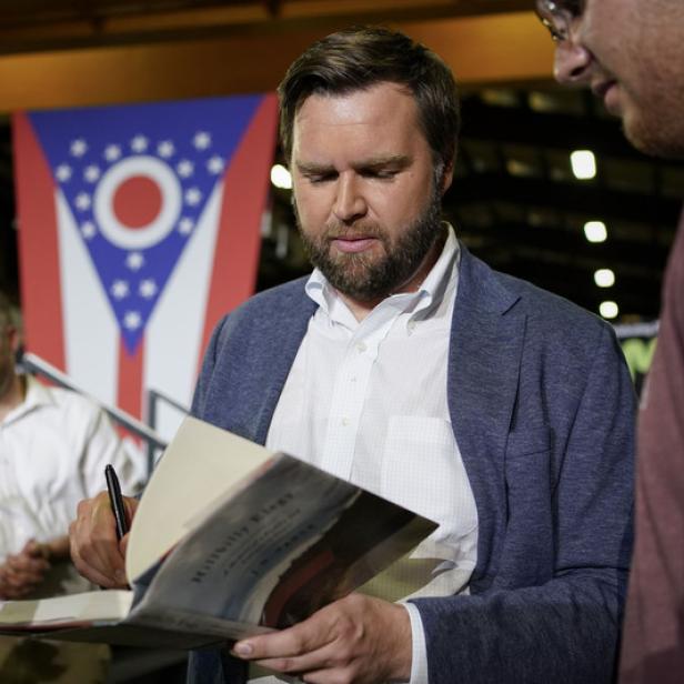 JD Vance, the venture capitalist and author of &quot;Hillbilly Elegy&quot;, speaks with supporters following a rally Thursday, July 1, 2021, in Middletown, Ohio, where he announced he is joining the crowded Republican race for the Ohio U.S. Senate seat being left by Rob Portman. (AP Photo/Jeff Dean)